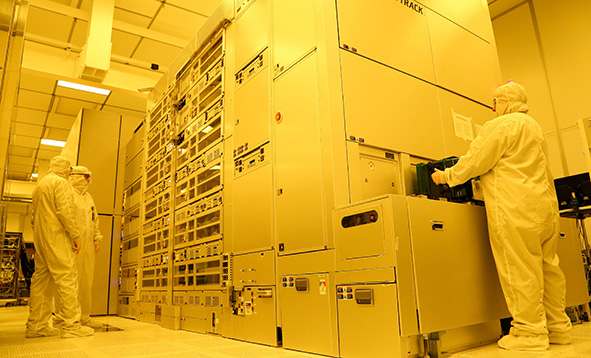 workers in a cleanroom