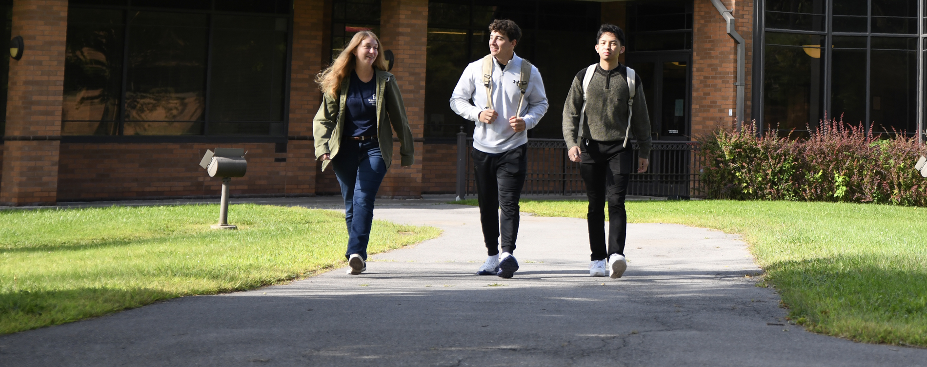 Three students walking