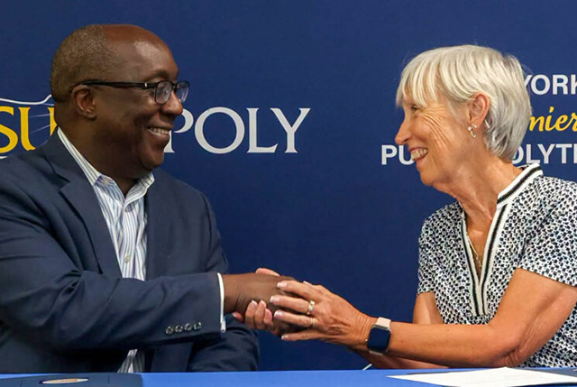 Photo of the signing of the endowed scholarship.
